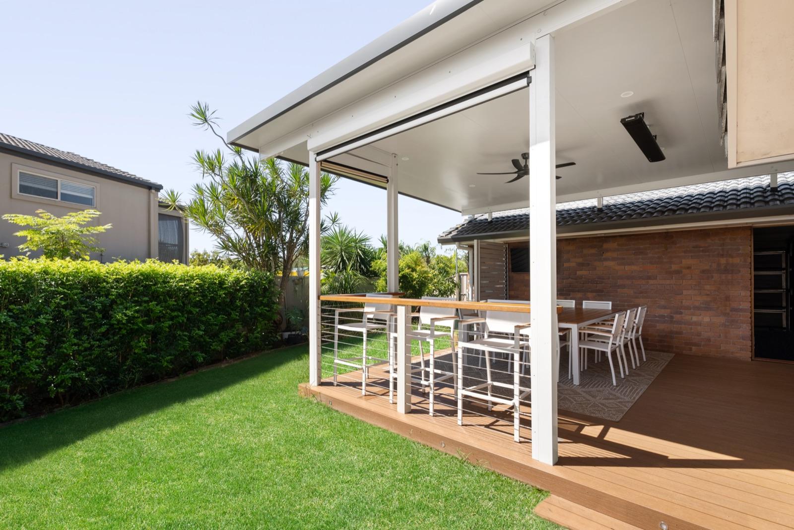 Insulated patio over a timber deck with outdoor breakfast bar
